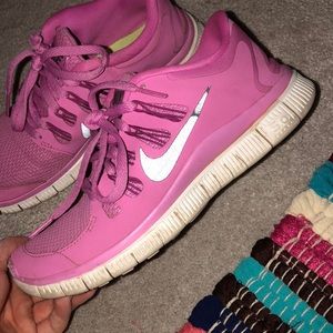 Purple/pink Nike Free Runs